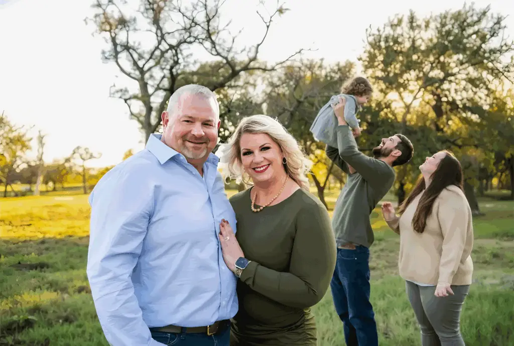 owners Brad and Melissa Lyle with there family outdoors